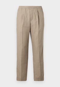 Pantalones beiges de corte holgado con cintura elástica, piernas rectas y dos pliegues frontales. Confeccionados en un tejido texturizado y tejido.