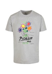 Grå bomulds t-shirt med et grafisk motiv af en hånd, der holder en buket af farverige blomster, med teksten "Picasso apoh London" under.