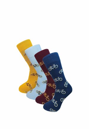 Cztery kolorowe skarpetki w kolorach żółtym, jasnoniebieskim, bordowym i granatowym, każda ozdobiona małymi ikonami rowerów, ustawione pionowo na białym tle.