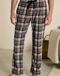 Beige plaid pajama pants with navy and maroon accents, featuring an elastic waistband with a navy drawstring and lightweight fabric.