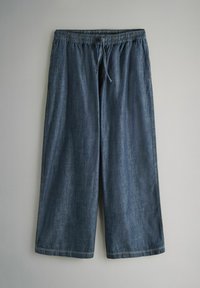 Tumedat sinised denim culotid elastse vöökoha ja sidumisniidiga. Lõdva istuvuse, sirgete jalgade ja korralikult viimistletud äärtega.