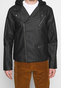 Nominal Veste en similicuir - black
