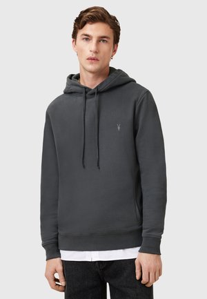 Dunkelgraue Kapuzenjacke aus weichem Stoff, mit einer Kängurutasche, verstellbaren Zugbändern und einem kleinen Logo auf der Brust.