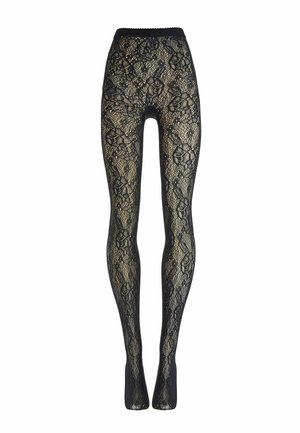 Zwarte panty met kantpatroon en bloemenmotief, verticaal uitgerekt getoond, waarbij de beige achtergrond door de stof zichtbaar is.