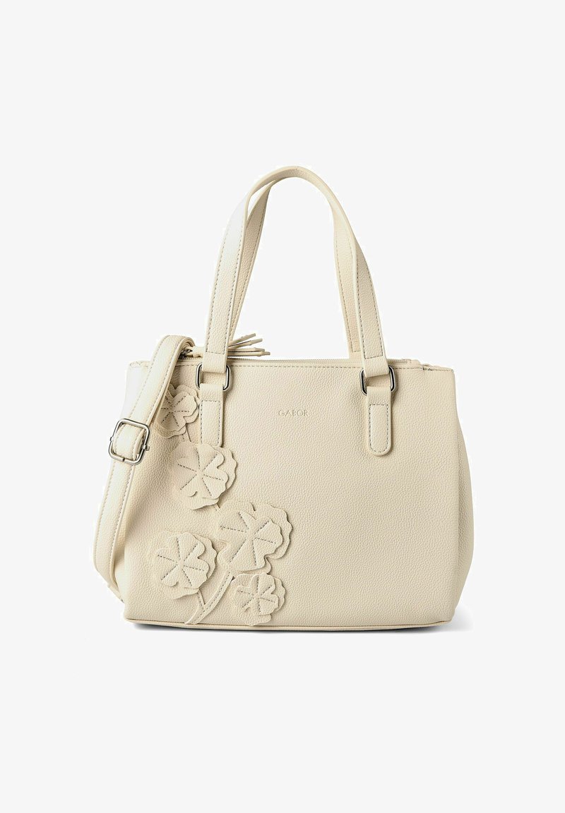 Sac à main en cuir couleur crème avec deux poignées, une bandoulière amovible et des décorations florales en applique sur le devant.
