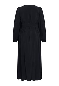 Robe longue noire avec manches longues, poignets élastiques et large ceinture, vue de dos sur fond blanc.