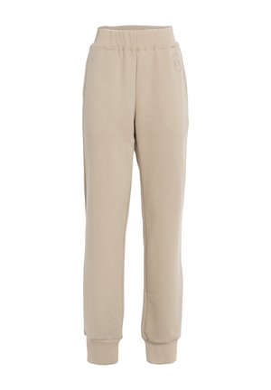 Pantaloni tuta beige con vita elastica, polsini a costine e un piccolo logo sulla coscia sinistra. Realizzati in tessuto morbido e testurizzato.