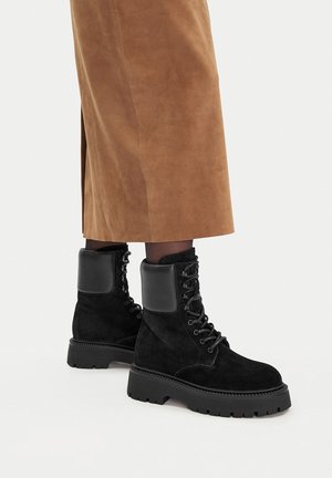 Stivaletti con plateau - black