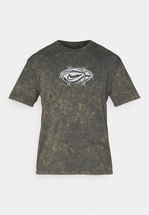 Dark gray acid-wash t-shirt with short sleeves and white graphic of a barbed wire oval encasing a stylized Nike swoosh on front center.