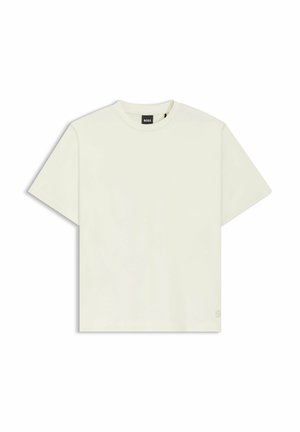 Short-sleeve t-shirt, cream color, made of soft cotton fabric, crew neck design, with a small logo accent on the bottom hem.