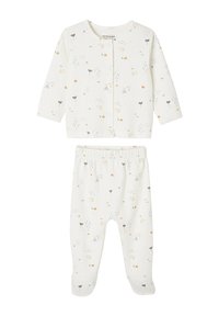 Two-piece infant outfit featuring a white, cotton cardigan with button closure and printed pants, both displaying colorful patterns and accents.
