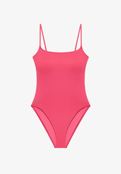 Ροζ ολόσωμο μαγιό με λεπτές τιράντες στους ώμους και μικρό πράσινο κεντημένο λογότυπο κοντά στο αριστερό ισχίο, χωρίς ραφές.