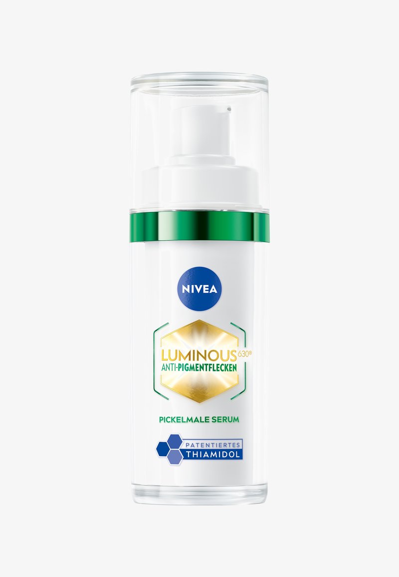 White bottle with a clear pump top, accented by a green band. Label features gold hexagon and blue circle with NIVEA branding.