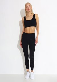 Carlheim SPORTS HELLE ACTIVE HIGH SUPPORT - Steznik - black