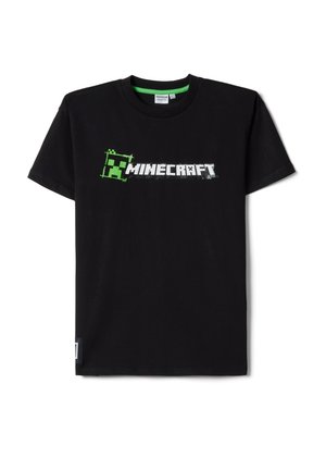 T-shirt noir à manches courtes avec visage pixelisé vert de Minecraft Creeper et logo blanc de Minecraft centrés sur la poitrine.