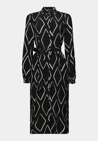 Robe midi noire à manches longues avec motif géométrique blanc en forme de losange, boutonnée sur le devant, col et ceinture à nouer à la taille.