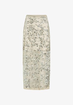 Kreemikas midi seelik läbipaistva pealiskihiga, kaunistatud hõbedaste litritega hajutatud lillemustris.