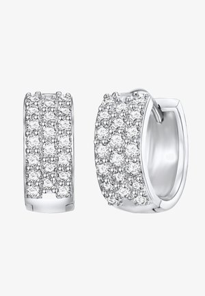 Orecchini a cerchio in argento che presentano una fila di pietre di zirconia cubica trasparente, contornate da piccole perline metalliche per aggiungere texture e brillantezza.