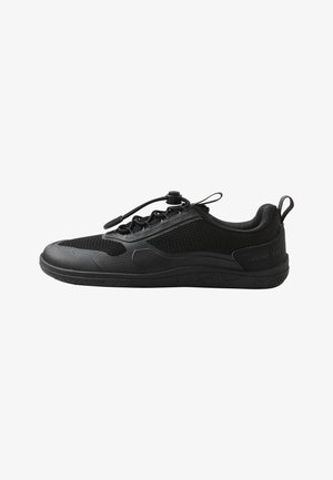 Black athletic shoe featuring a mesh upper, rubber sole, and a toggle lacing system for adjustable fit. Textured accents on the sides.