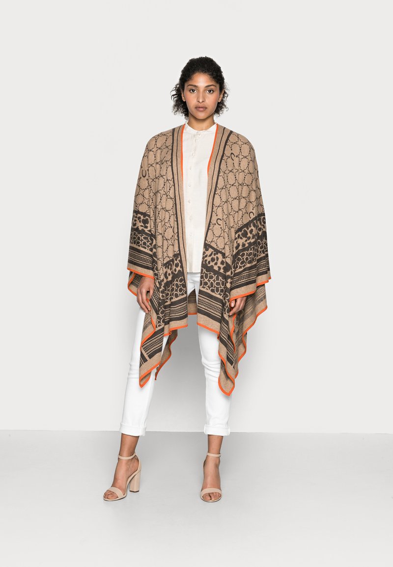 Codello PONCHO LOGO PATTERN - Cape - camel - Zalando.de