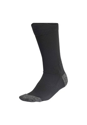 Sort crew sok med grå forstærkning i hælen og tåen, med ribbet øvre del og tekstureret polstring på sålen og bagsiden.