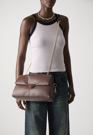 LARGE SOFT PUFF - Cross body bag - brown