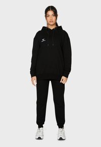 SQUATPROOF SP LEFT COMFY ACTIVE PUMP COVER  - Jersey con capucha - black