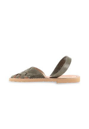 Flat sandal with tan sole and gray snakeskin-textured straps, featuring an open toe design and a single back strap for support.