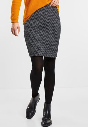 Gray knee-length pencil skirt with herringbone pattern, paired with black tights and ankle boots, featuring a fitted design.