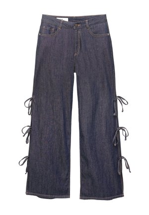 Denim wide-leg pants in dark blue with side ties and a button closure. Features front pockets and a relaxed silhouette.