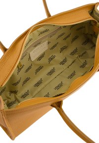 Yellow leather handbag with a textured surface. Interior lined with beige fabric featuring repeated brand logo "VENEZIA." Includes zipper closure.