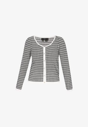 Zwart-wit gestreepte cardigan met lange mouwen, ronde halslijn en witte afwerking. Heeft zilveren knopen en een aansluitende pasvorm.
