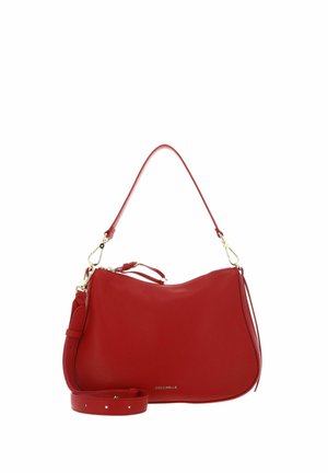 Red leather handbag with dual detachable straps, gold hardware, and small brand logo on front, shown on white background.