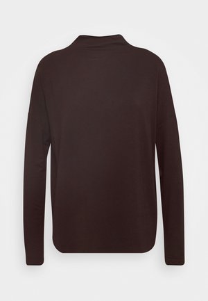 Long-sleeve shirt in dark brown, featuring a soft fabric, relaxed fit, and rounded hem with a subtle collar. No additional details visible.