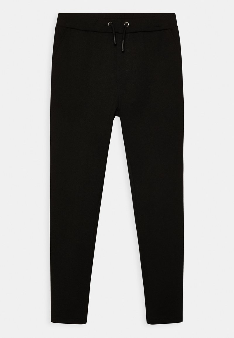 Pantalon de survêtement noir slim avec ceinture élastique et cordon, présenté à plat sur fond blanc. Aucun logo ou motif visible.