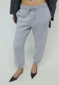 Calliope GINNICO UNITA - Pantaloni sportivi - grigio medio melange