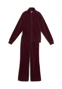 Maroon corduroy tracksuit featuring a zip-up jacket with two front pockets and matching elastic-waist pants. Textured fabric, relaxed fit.