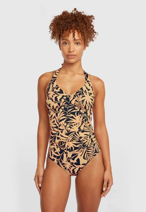 Zwart en perzikkleurig badpak met een halternekontwerp, voorzien van tropische bladmotieven, zachte stof en een aangesloten silhouet.