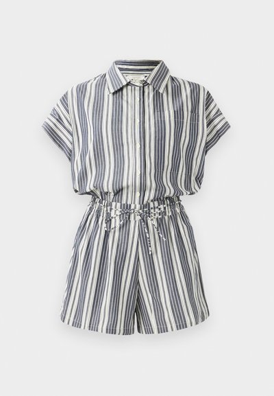 Stripet kortermet jumpsuit i marineblå og hvit, med knappestolpe foran, elastisk midje med snor og sidelommer.