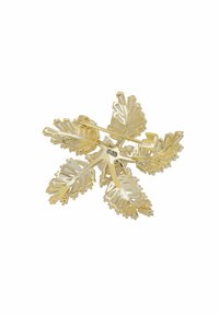 Gold-tone brooch shaped like leaves, featuring intricate cut-out designs and a shiny, polished finish. Secured with a metal pin.