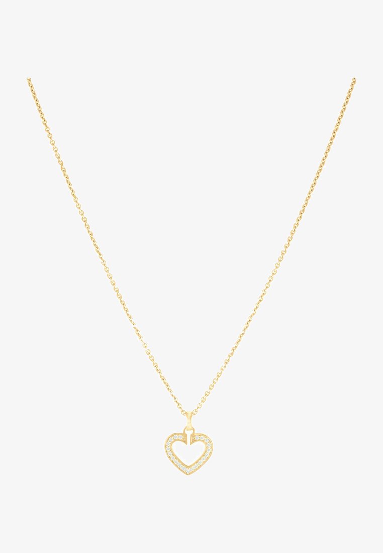 Guld halskæde med en hjerteformet vedhæng prydet med klare ædelsten, som fremhæver en poleret overflade og indviklet detaljering.