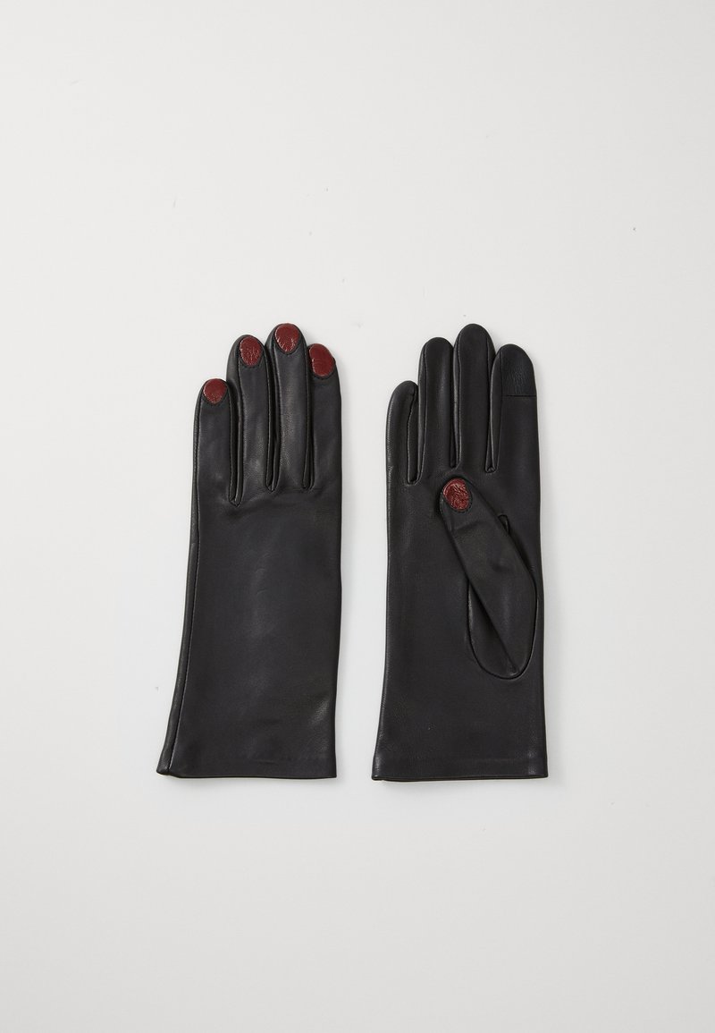 Black leather gloves with red accents on fingertips and palm. Soft texture, fitted design, with a separate section for the thumb.