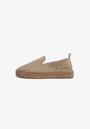 Beige suede slip-on shoe with espadrille-style braided jute sole, featuring a small back heel tab and cutout side detail.