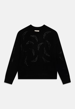 Pull en tricot noir à manches longues, avec un design texturé de petites accents argentées disposées en motifs circulaires.