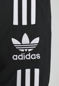 adidas Originals LOCK UPTT - Treniņjaka - black