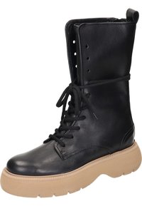 Botte en cuir noir à lacets avec un bout rond, une tige haute et une semelle en crêpe beige. Elle dispose d'une fermeture éclair et d'œillets en métal pour les lacets.