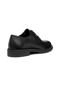 Scarpa stringata in pelle nera con finitura liscia, punta tondeggiante, suola robusta con trazione e dettagli di cucitura sottili lungo le cuciture.