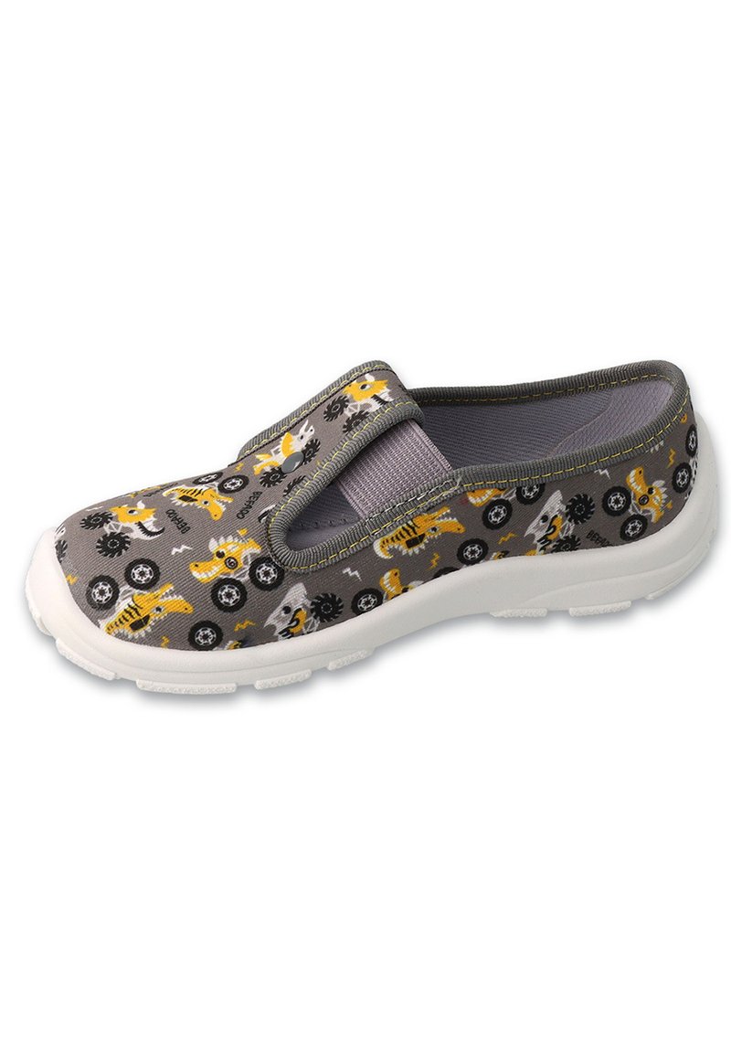 Szare buty wsuwane z gumową podeszwą, z zabawnym wzorem dinozaurów i maszyn w kolorze żółtym i czarnym. Elastyczna, miękka tkanina na górze.