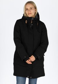Black winter coat with a hood, featuring a zip closure, tan accents, and a slightly padded design. Includes side pockets and snap buttons.