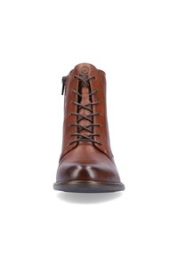 Des bottines en cuir marron avec une finition lisse, un bout arrondi, un design à lacets verticaux et une fermeture éclair sur le côté pour un accès facile.